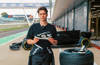Alex Witty, founder of Compound Footwear, with his sustainable sneakers made from recycled motorsport tyres