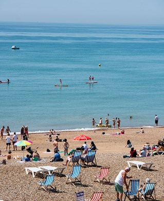 Busy Brighton seafront in the summer