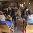 Students helping older people avoid falls