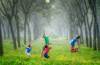 Children playing with a ball photo by Robert Collins on Unsplash