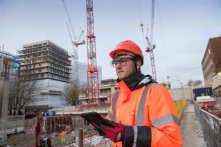 Construction student on building site
