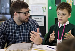 Primary education teacher and students