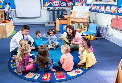Male and female teacher reception classroom