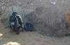 Researchers investigating weathered carbonatite in Mongolia