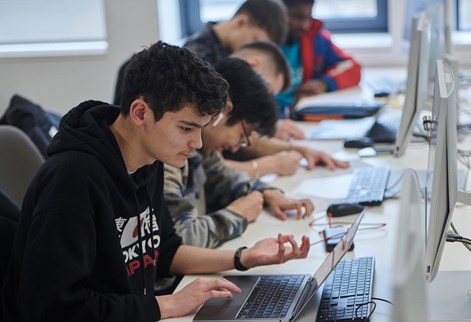 Students working on computers