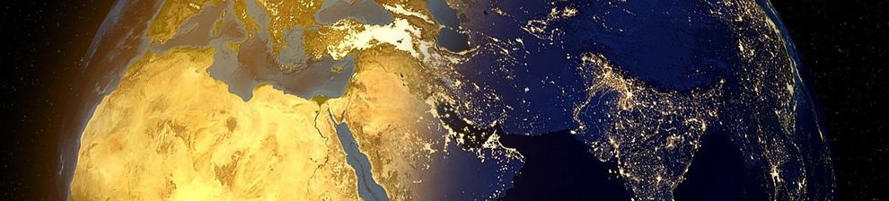 Image of planet earth with half daylight across continents of Africa and Europe with Asia under night sky with electric light traces. Courtesy Alex Shoha and Pixabay.