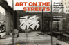 Film poster for Art on the Streets with large title and bombed roofless building with white dove icons in artwork. Logos for AHRC, Four Corners films and University of Brighton.